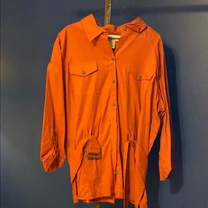 Orange blouse with belts